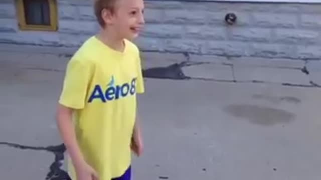 Kid gets hit with a basketball and starts yelling