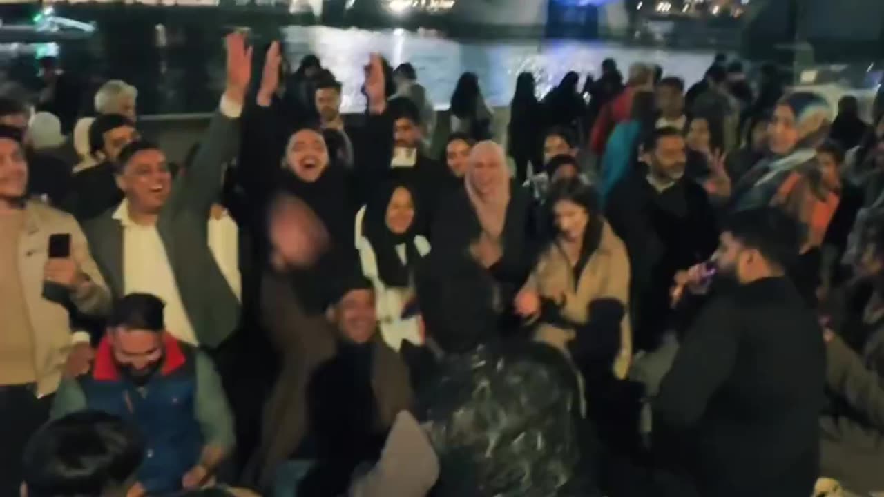 Immigrants are shouting and singing on London Bridge, which is visited by