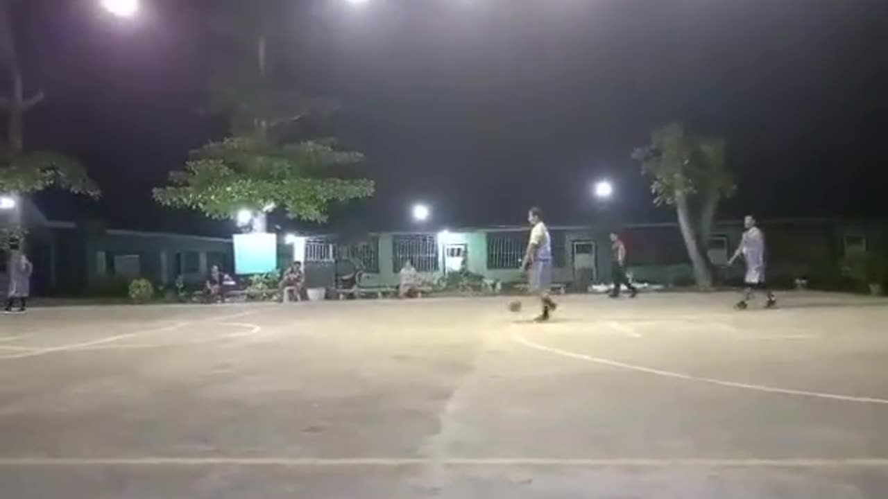 Edrian playing basketball by minutes and seconds. Town.