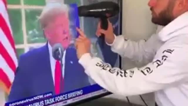 TSVN32 6.2021 TRUMP HAIR BLOWING IN THE WIND ON TV