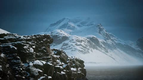 snow covered mountains in northern ocean