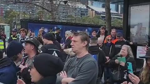Parents gathered in the streets of Melbourne, Australia and sang “Leave those kids alone”