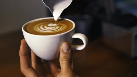 Serving a sparkling cappuccino in a cup