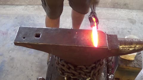 Forging a lizard from a railroad spike