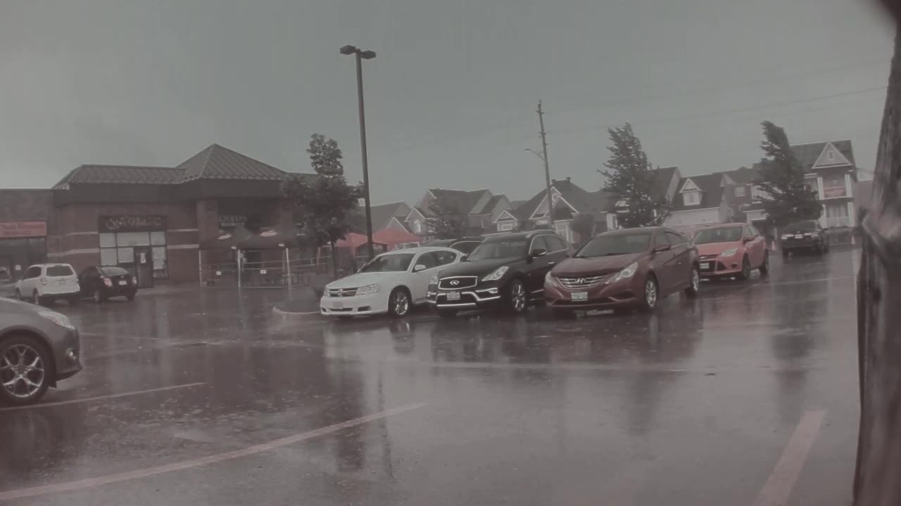 Tesla Cam Captures Tornado Tearing Up Parking Lot