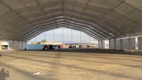 Installation of a large tent, interior view from the inside
