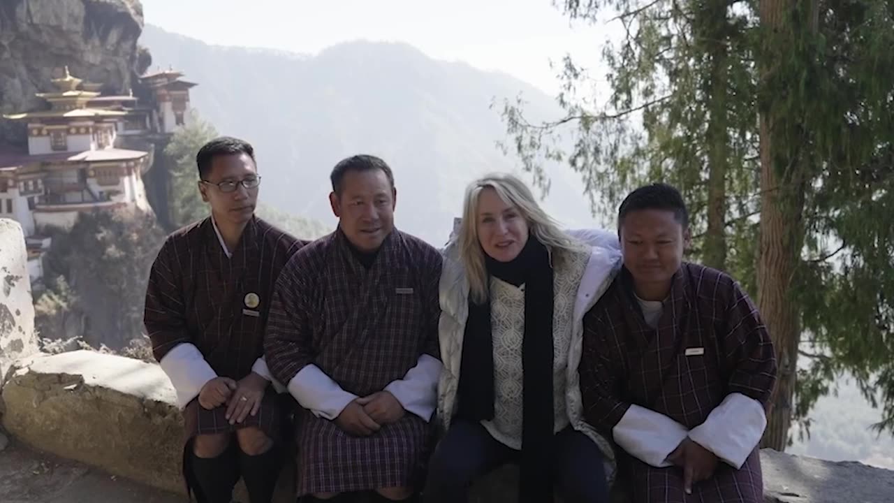 Marcia Thanks Guides on Mountain Trail in Bhutan | Kimpton's Bright Lights Travel Show