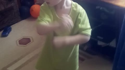 The child is learning to dance