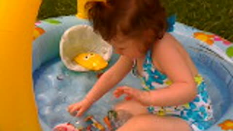 Samantha in her new pool