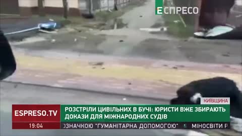 Genocide in Ukraine with dead people on street getting up after camera went pass.