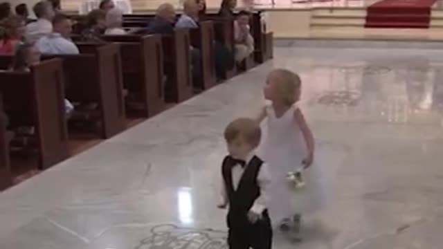 Kids add some comedy on the wedding.