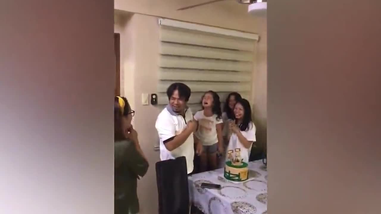 Girl throws tantrum after dad blows out candles on his birthday cake