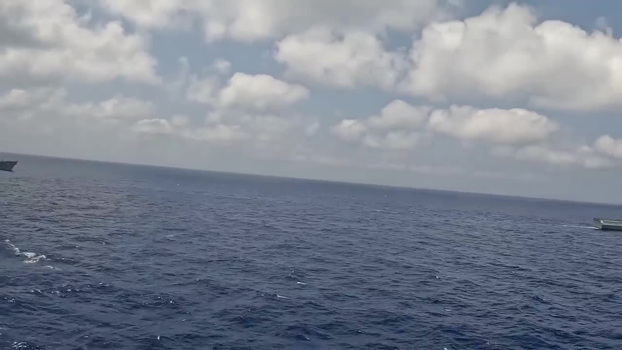 Navy F/A-18 Breaking The Sound Barrier Over Water