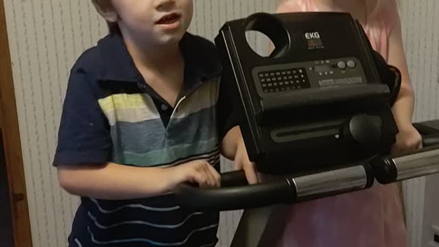 Children using exercise equipment