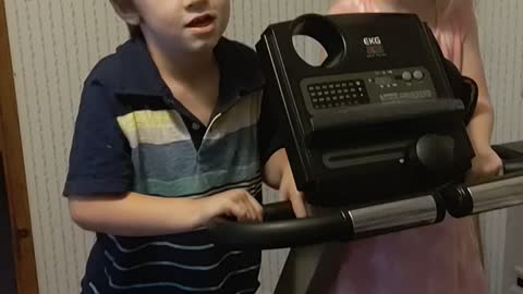 Children using exercise equipment