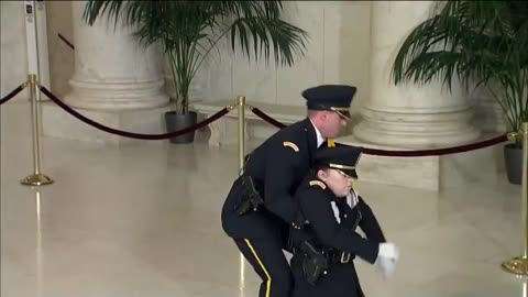 Honor Guard collapses as Justice Sandra Day O'Connor lies in repose in court's Great Hall