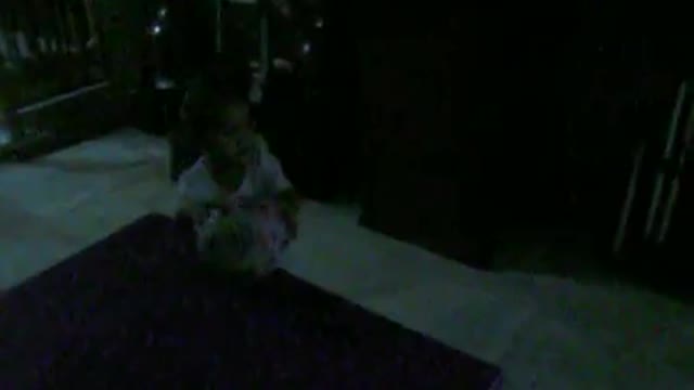 Cute 2 year old girl plays at night