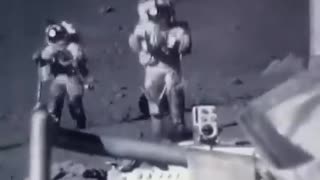 Sped up footage of astronauts jumping and tripping on the moon