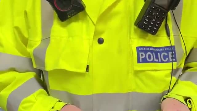 Police trying to arrest a man in Manchester for not wearing a mask