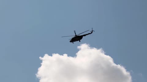 Helicopter flying in air