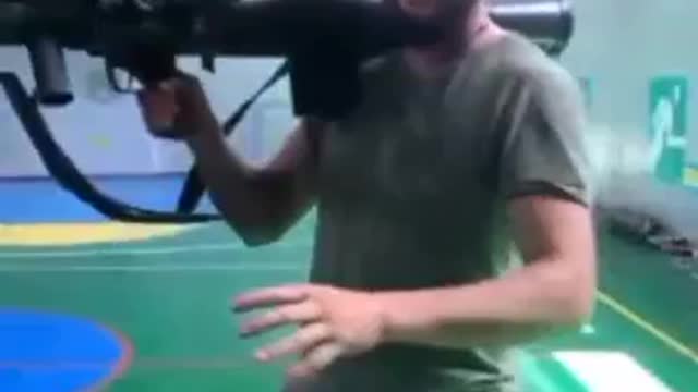 Ukrainian soldier shows off the Carl Gustaf inside a school