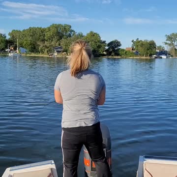 My wife catches a bass
