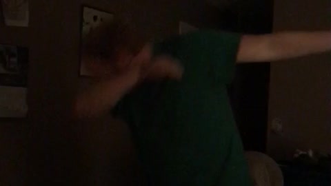 Guy green shirt sneezes and dabs