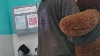 dancing with a giant teddy