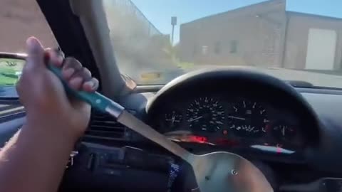 Bro driving with a spoon