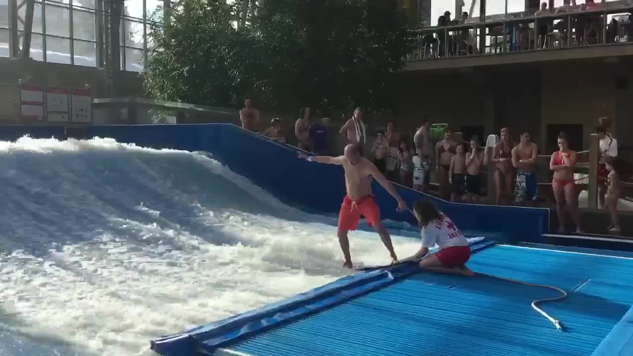 Orange swimsuit indoor surf fail