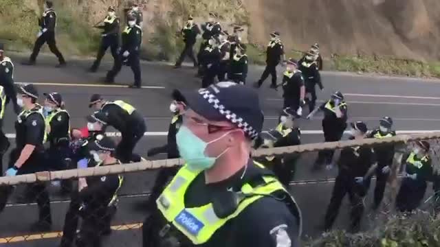 Australia: Police Push Elderly Woman to Ground, Mace her