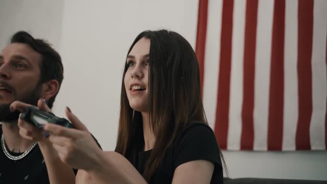 Couple Playing Video Game at Home