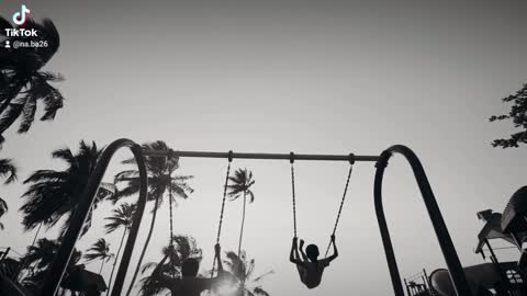 Children playing swing