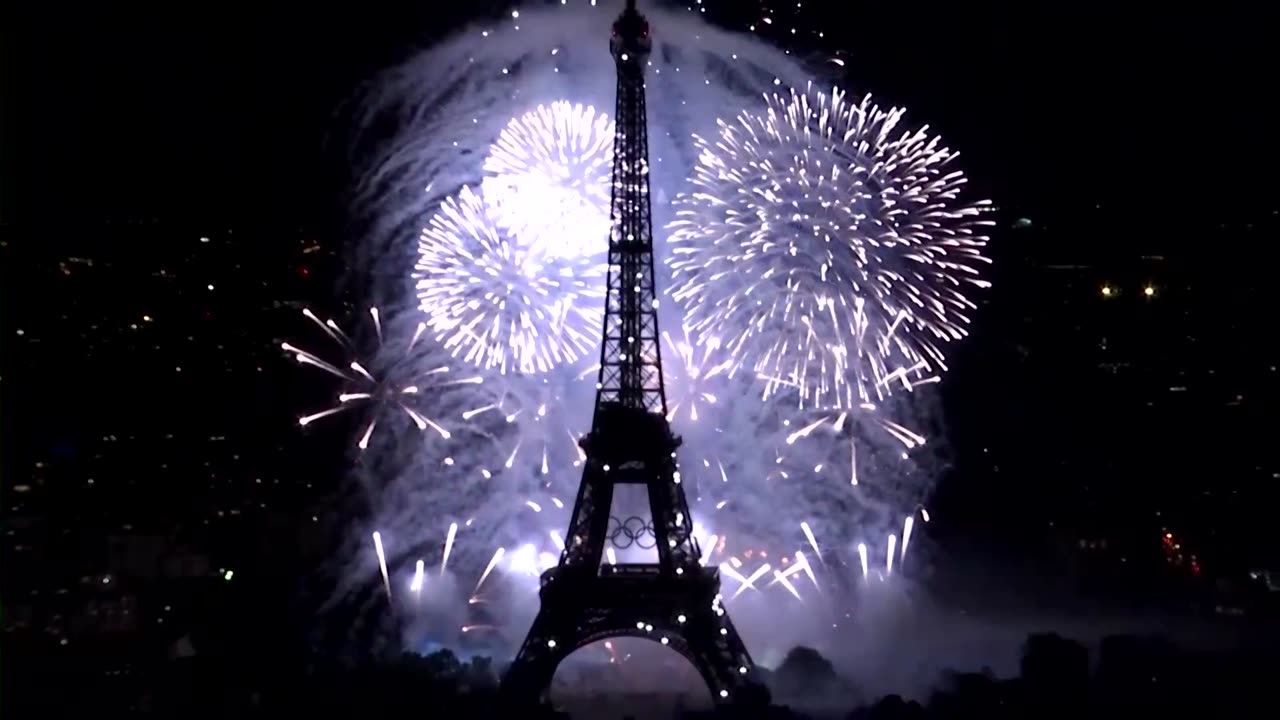 Olympic fireworks at Eiffel Tower mark Bastille Day