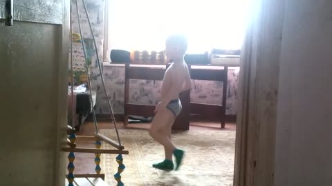 The child dances the lower break-dance.