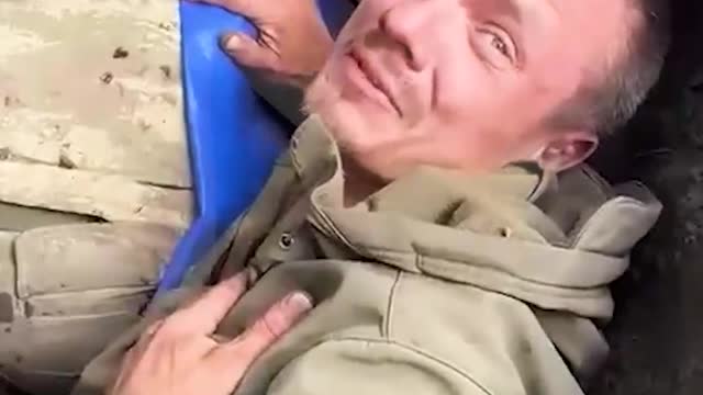 Ukraine War - Interrogation is conducted by a fighter from the militia of Zaporozhye.