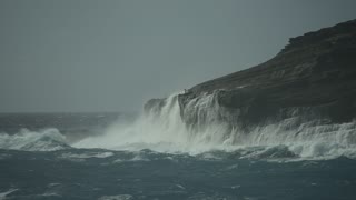 Tourist Almost Slammed by Massive Wave