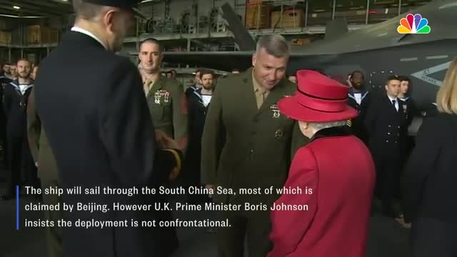 Queen Visits U.S. Marines Aboard New British Aircraft Carrier