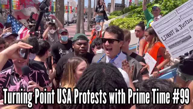 Alex Stein at TPUSA confronting protesters.
