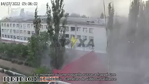 ️ The moment a Russian rocket hit a school in Mykolaiv. VIDEO surveillance cameras