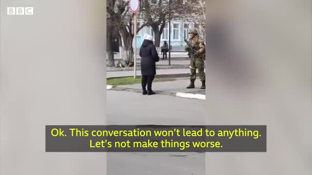 Ukrainian woman confront army Russian soldier