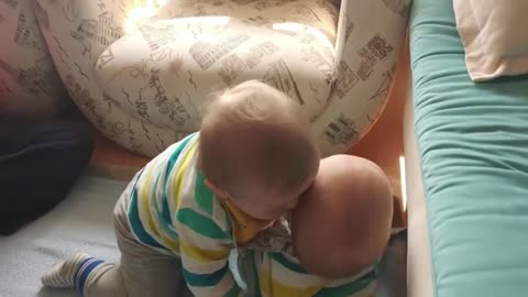 A pair of cute twins are playing