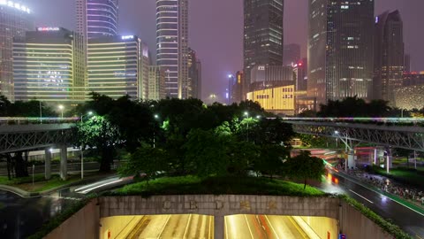 Underground tunnel and skyscrapers at night