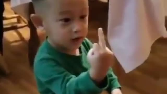 Boy shows middle finger 😃😃