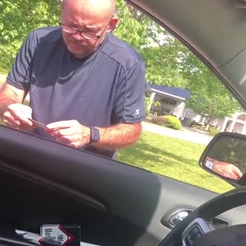 Cop caught on phone retaliates on the man that checked him