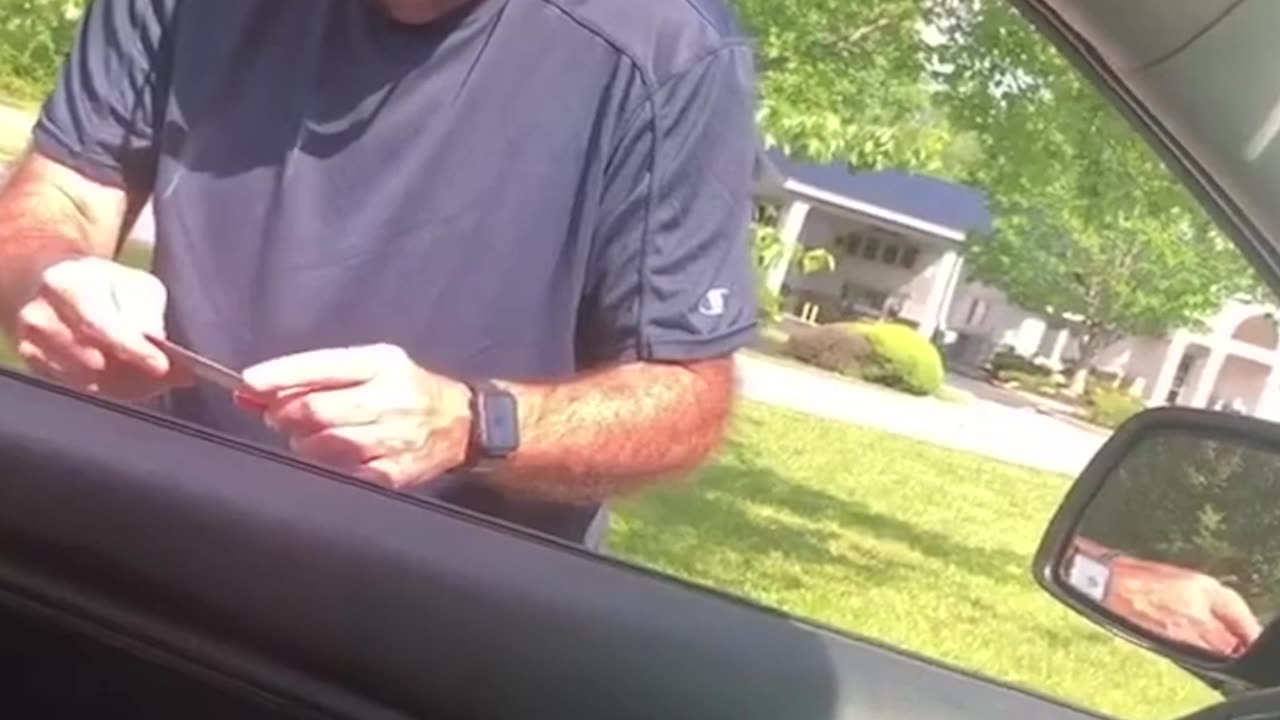 Cop caught on phone retaliates on the man that checked him