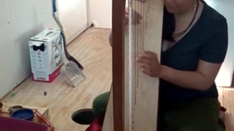 Lauren Plays her Celtic Harp for Leo