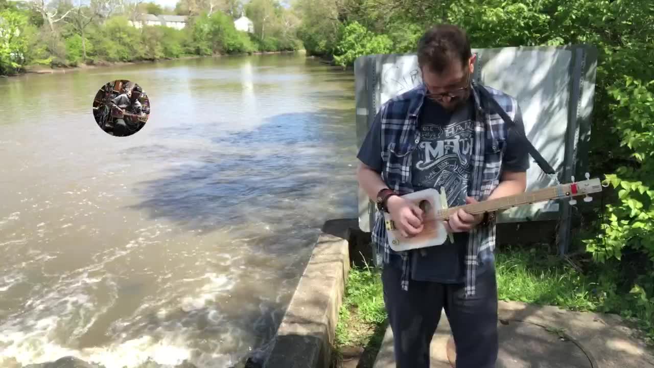 Swiss Cigar Box Guitar Shipped Down River