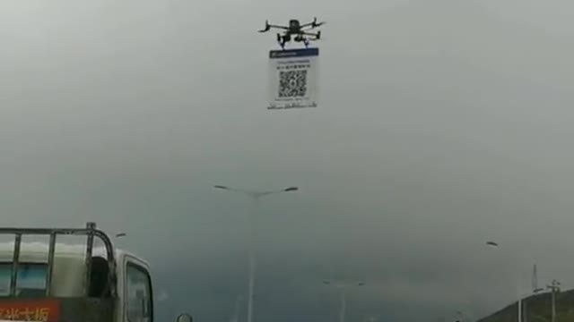 Chines Police Drones w/ QE Code regulating freedom of movement