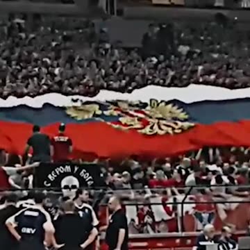Serbian football fans stretched a huge flag of Russia at the match with Ukraine.